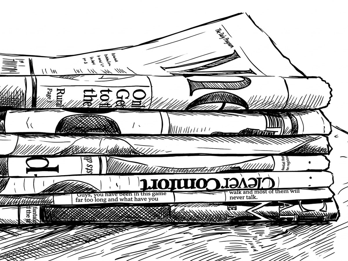A stack of folded newspapers piled one on top of another.